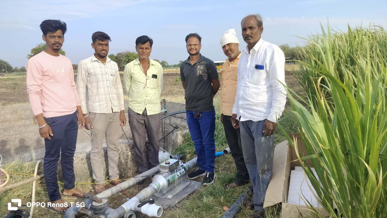 Agricultural field demonstration with sugarcane crops and water conditioning system installation